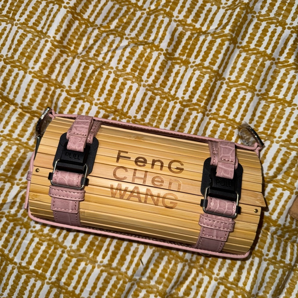 Pink and Tan Cylindrical Clutch with Metallic Accents